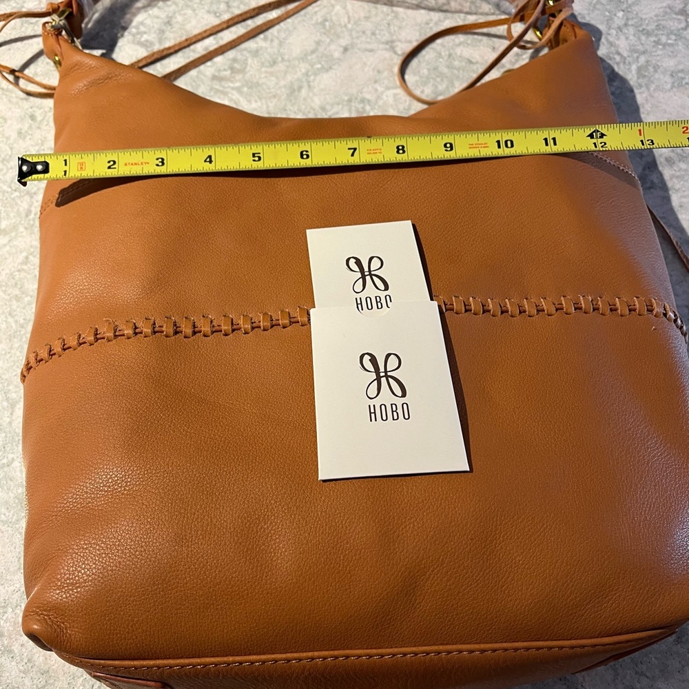 HOBO Tan Leather Hobo Bag with Slouchy Shape and Decorative Stitching